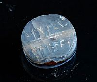 The bulla (belonging) to Nathan-Melech, Servant of the King, discovered March 31st, 2019. (Credit: ELIYAHU YANAI/CITY OF DAVID)